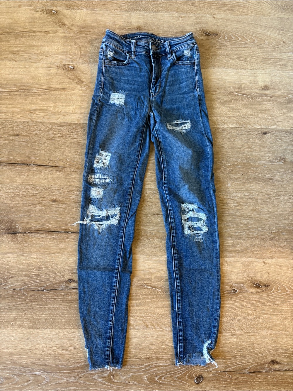 American Eagle Outfitters Distressed Blue Skinny Jeans with Frayed Hems